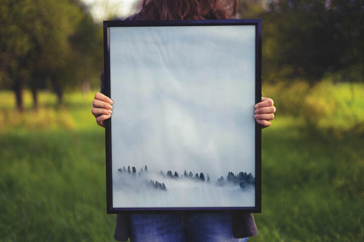 Woman Holding Frame – Free Mockup