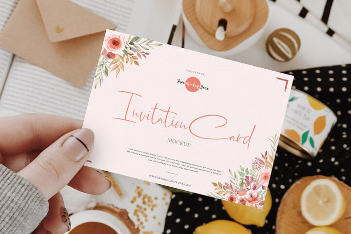 Girl Showing Invitation Card – Free Mockup