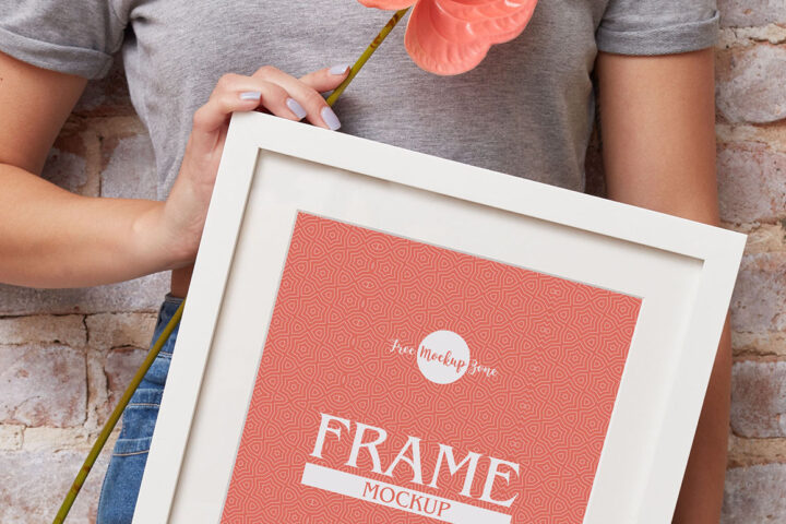 Girl Showing Frame – Free Mockup