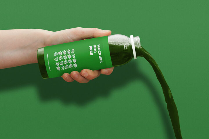 Juice Bottle in Hand – Free Mockup