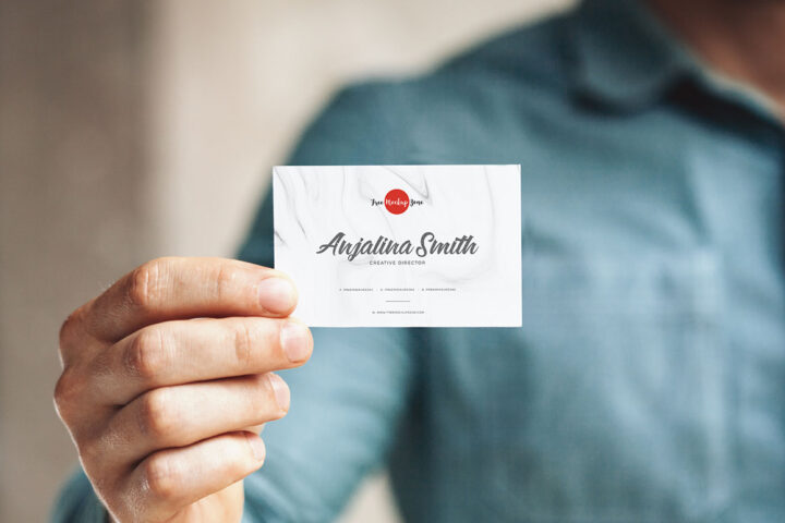 Man Holding Business Card Mockup