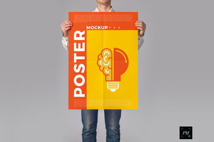 Man Holding Poster – Free Mockup